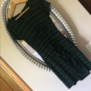 Green and black fitted dress flattering tummy